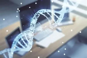 Mesa com computadores de bioinformática sobreposta por código de genoma